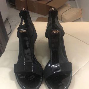 Black authentic Fendi wedge sandals with gold hardware.